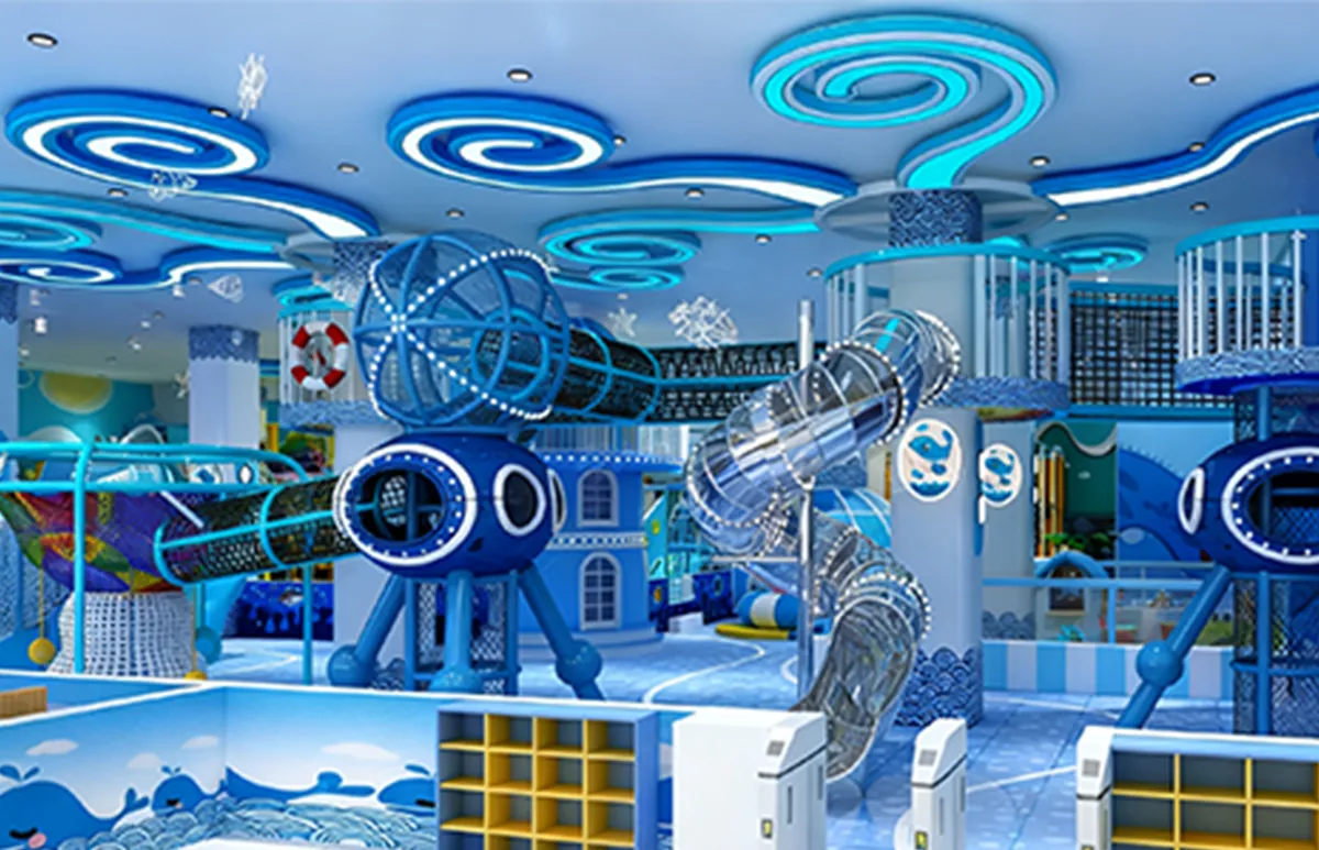 ocean adventure themed indoor playground design with blue submarine structures